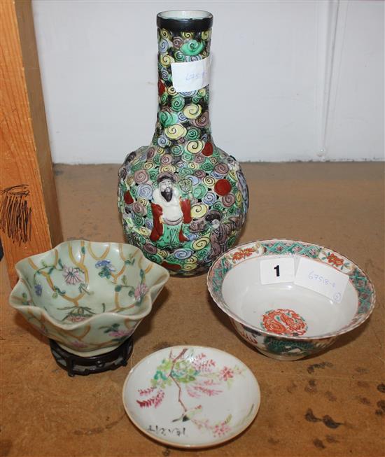 Chinese moulded bottle vase and a celadon lotus dish and wood stand